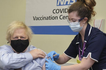 Boris Johnson recieves his first dose of AstraZeneca COVID vaccine