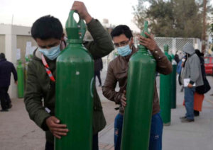 oxygen cylinders being distributed in Peru